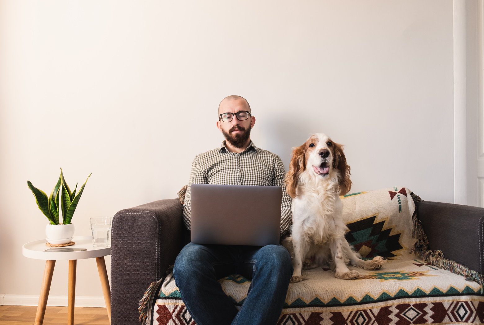 Man Working from Home with Pet Dog